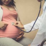 Темно-коричневые выделения при беременности: причины и лечение